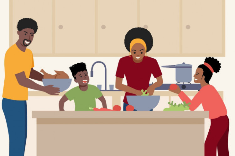 An African American family in a kitchen